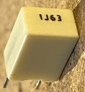 white c1 1uF capacitor